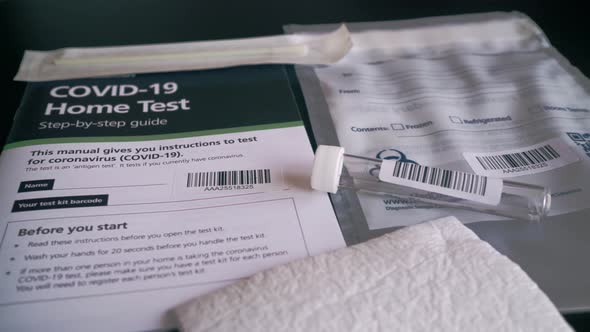 Covid-19 Coronavirus home test kit with guide, test tube and cotton q tip