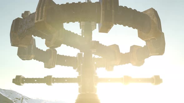 UFO Hovering Over a Forest at Sunset with Light Beam alt