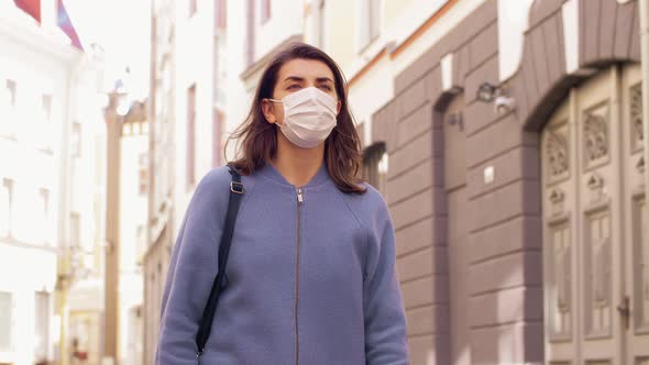 Woman Wearing Medical Mask Walking in City