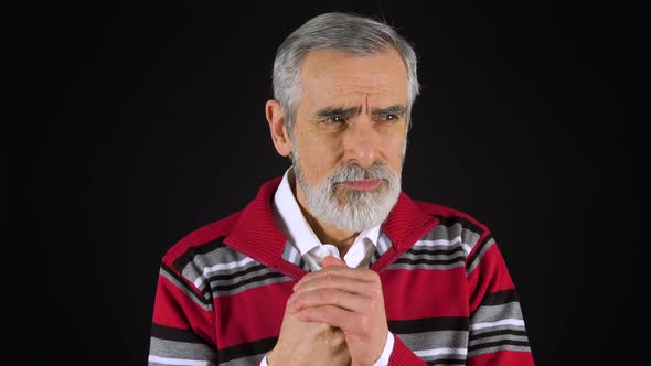 An Elderly Man Acts Frustrated - Black Screen Studio