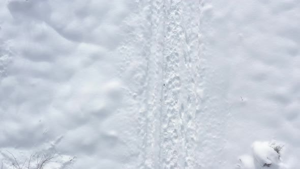 Lot of traces in the snow 4K aerial footage