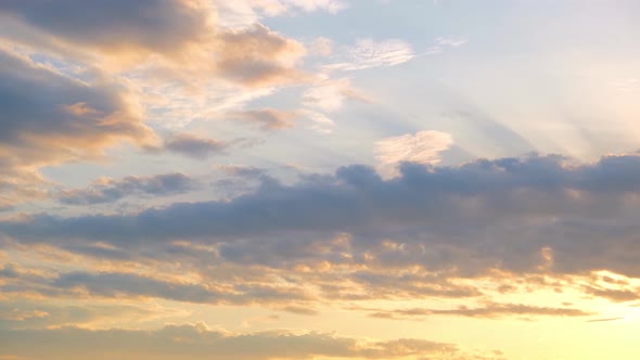 4K UHD : Time lapse of colorful sky during beautiful sunset. Romantic clouds