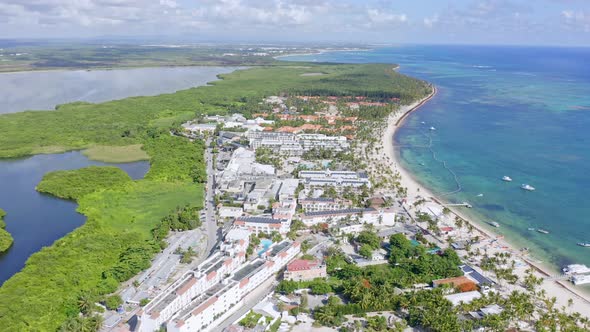 Stunning aerial view of luxury beachside resorts and Laguna Bavaro, Punta Cana