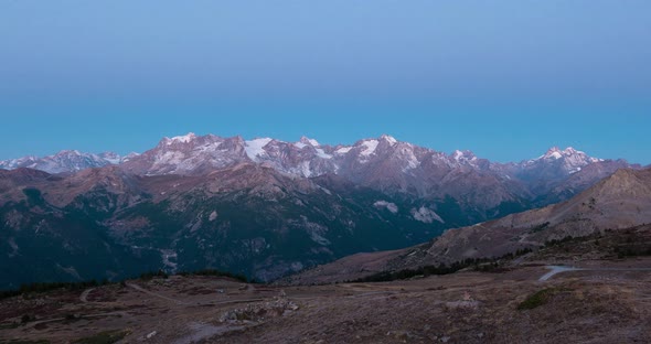 Time lapse sunrise from twilight to day on the the Alps