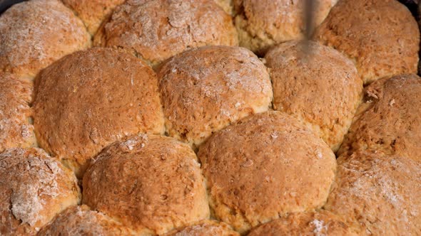 Ruddy Balls of Gingerbread on a Castiron Frying Pan