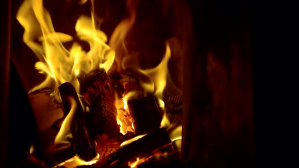 Close-up of the Burning of Fire in the Furnace for Heating in Slow Motion
