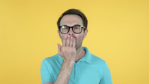 Flying Kiss By Man, Yellow Background