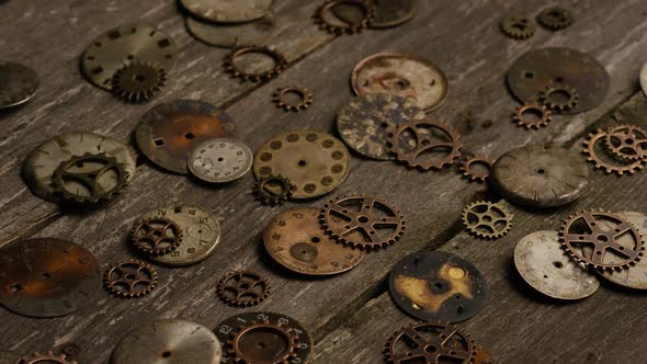 Rotating stock footage shot of antique and weathered watch faces - WATCH FACES 087