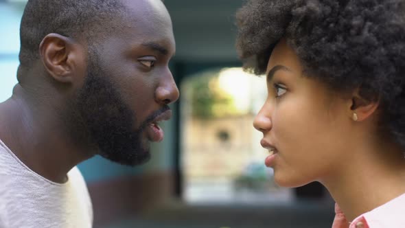 Man and Woman Talking Aggressively Outdoor, Relation Difficulties, Conflict