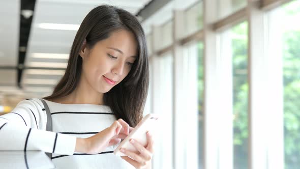 Young Woman use of smart phone 