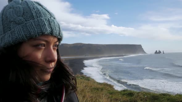 Close Up Of Woman With Ocean Cliff Backdrop