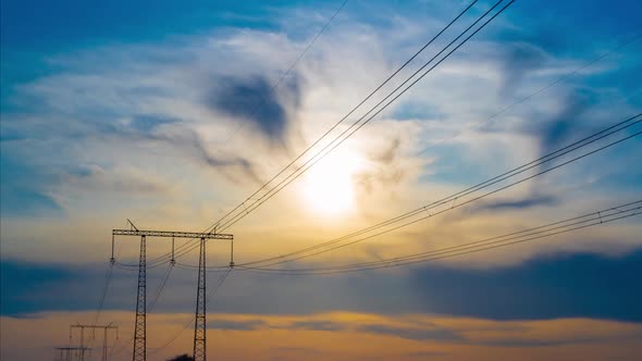 Timelapse of the Sky at Sunset Against the Background of an Electric Pole with Wires