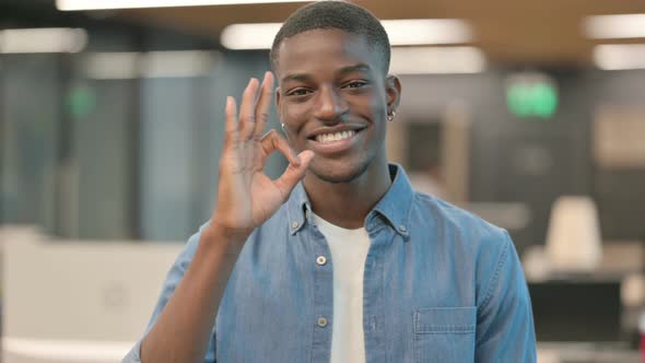 Positive Young African American Man Showing OK Sign