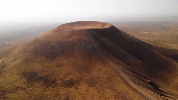 Space Ship Rising Above Volcanic Cone on Mars