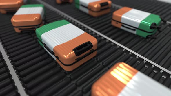 Travel Suitcases with Flag of the Repulic of Ireland on Conveyer