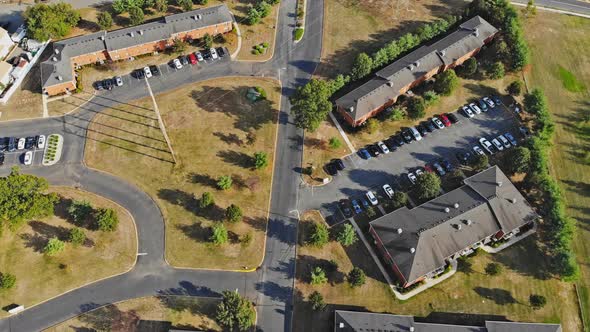 Small Apartment Complex in Autumn Landscape Top Aerial View of a Typical Suburb