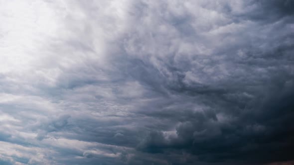 Timelapse of Gray Cumulus Clouds Moves in Blue Dramatic Sky Cirrus Cloud Space