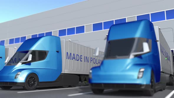 Modern Trailer Trucks with MADE IN POLAND Text at Warehouse