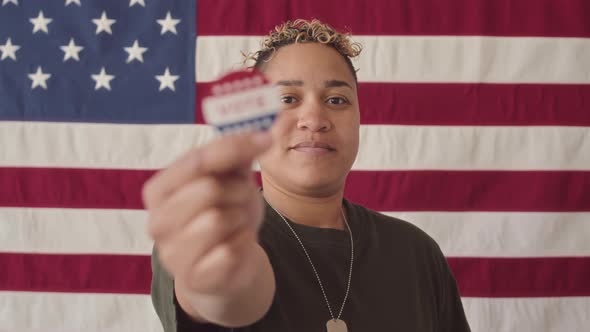 Portrait of Biracial Military Woman with Vote Sticker on Elections Day