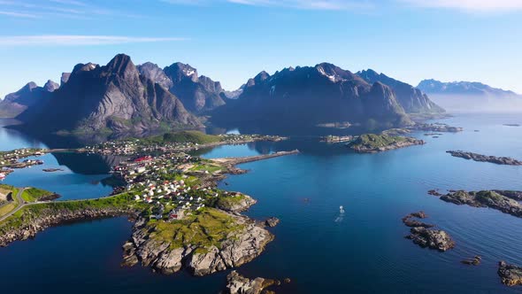 Flight over the sea and view on the fishing village Reine and Hamnoya ,Lofoten Islands,Norway