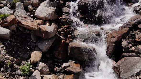 Stream Flowing Over Rocks On The Steep Mountains Near Stausee Wasserfallboden In Kaprun, Austria. -