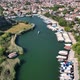 Dalyan - Mugla - Turkey, March 18, 2022, Moving boats with Mugla Dalyan view - VideoHive Item for Sale