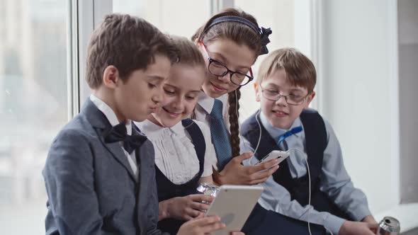 Schoolchildren Relaxing After Lessons