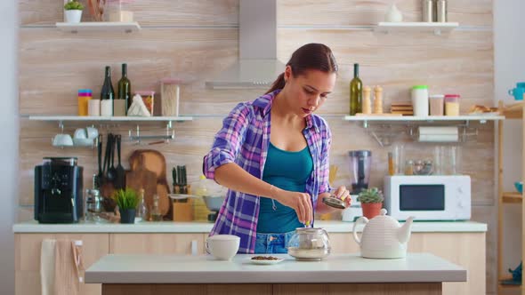 Woman Preparing Green Tea