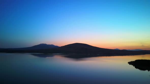 Aerial Video of Beautiful Mountain Lake on a Frosty Autumn Morning.