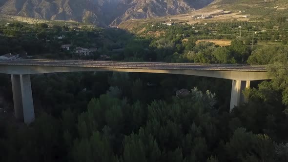 Aerial view of two bridges, an old one and a new one.