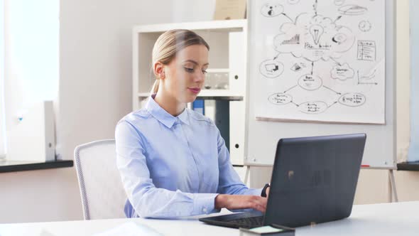 Businesswoman with Laptop Working at Office 49