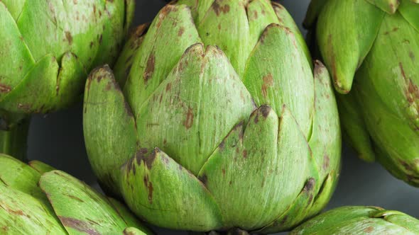 Whole Fresh Artichokes on Plate