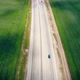 Aerial Flight Over the Road Between Fields. Summer Colors - VideoHive Item for Sale