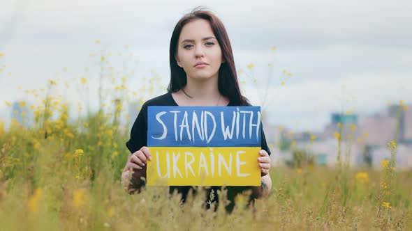 Portrait of Upset Girl Woman Patriot Holding Cardboard Inscription Political Slogan Stand with