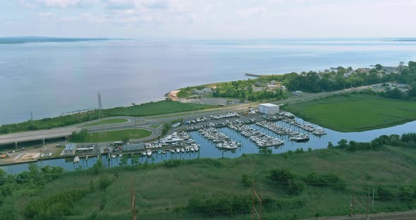 Aerial over small marina on a dock basin in small harbor, aerial view