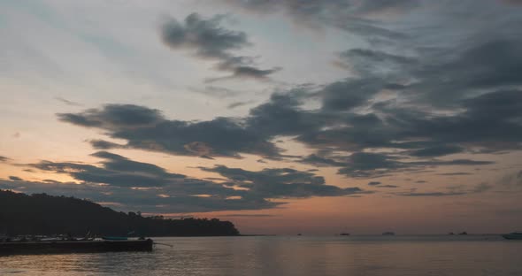 Timelapse Sunrise From Dark to Bright Day Sun Over Sea Waves are Washing