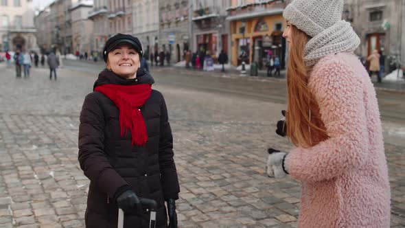 Lesbian Couple Tourists Meeting After a Long Separation Two Women Runs to Meet Each Other in City