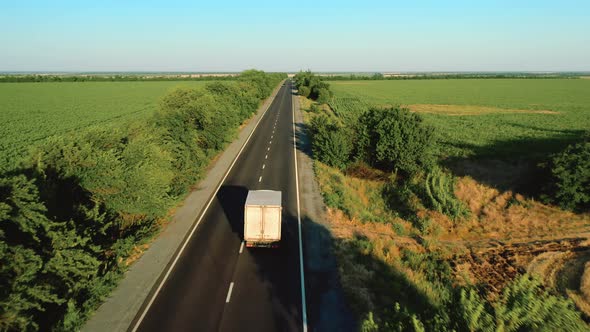 Lorry Rides on an Asphalt Road Top View