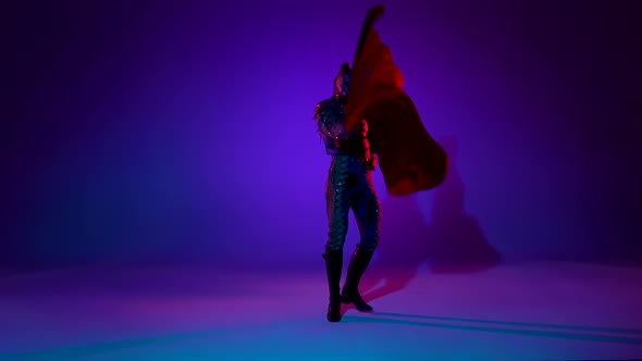 Torero in Blue and Gold Suit or Typical Spanish Bullfighter Isolated Over on a Blue Background