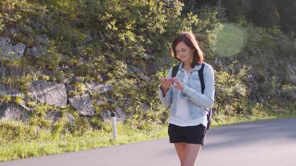 Woman Using the App To Search for an Address