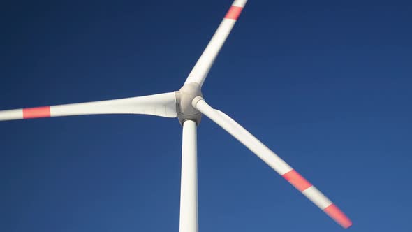 Closeup of a rotating wind turbine. Closeup of a wind turbine nacelle.