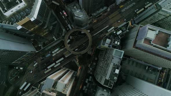 Aerial view of vehicles driving a roundabout in Shanghai downtown, China.