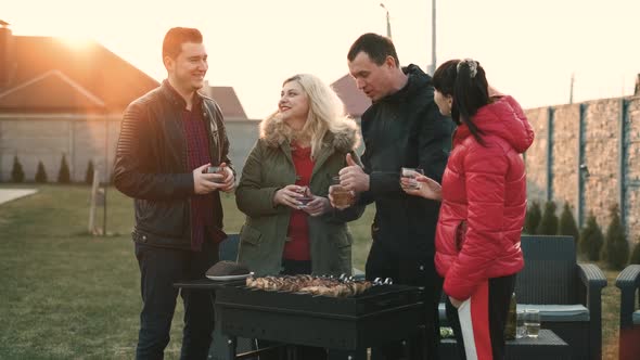 Happy Friends Having Fun Outdoor. Young People Enjoying. Youth Friendship Concept. Hands Toasting a