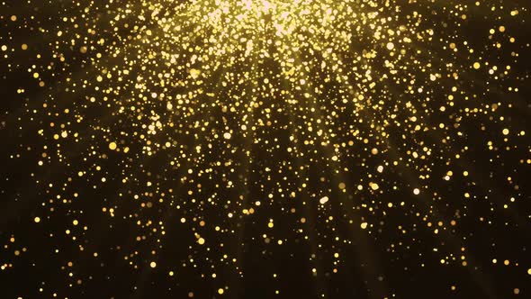  Super slow motion Abstract glittering golden particles Light on black.