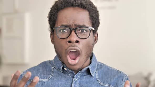 Shocked African Man Reacting to Loss