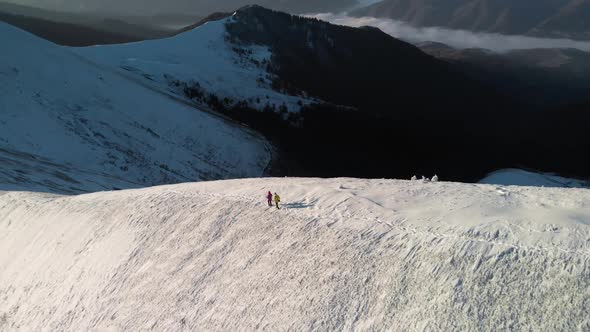 Aerial Unveil Shot of Mountain Valley in Winter