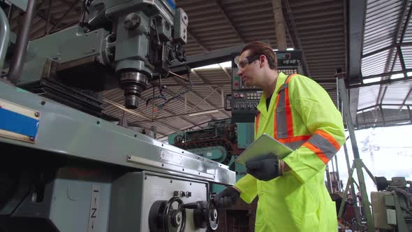 Factory Worker Warn Coworker About Safety and Give Hardhat to Him