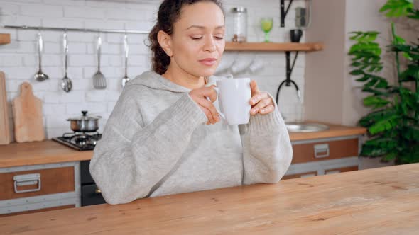 Brunette Enjoy Tea in Apartment