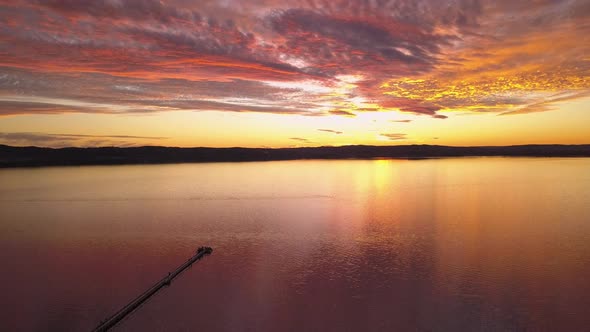 Beautiful sunrise or sunset at Sydney Skyline at Long Jetty Wharf. Central Coast, Australia.