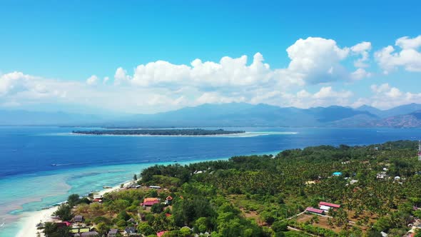 Aerial panorama of beautiful sea view beach trip by turquoise sea and white sandy background of a da